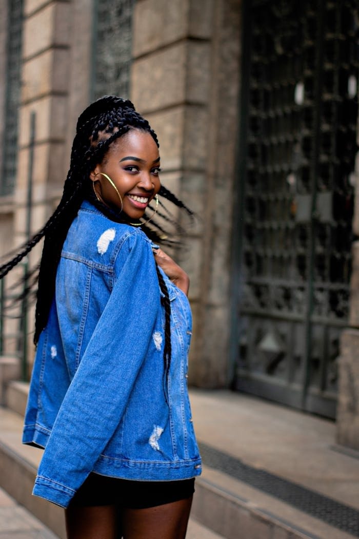 Photo of Woman Wearing Denim Jacket